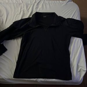 4Xl runs small about a large to X-Large black long sleeve tactical shirt